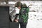 Boy playing piano outdoors