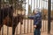 Boy playing with ponies