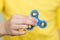 A boy is playing a popular toy fidget spinner in his hands. Stress relief. Anti stress and relaxation fidgets, spinner for tired.