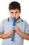 Boy playing recorder