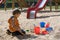 Boy playing in sand box