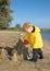 Boy playing with Sandcastle