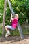 Boy playing on a swing