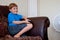 Boy playing video game on TV
