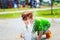 Boy playing in water fountain