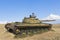 Boy plays on the T-64 tank in the Ataman ethnographic complex. Taman Temryuk district of the Krasnodar region