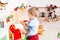 Boy plays with wooden toys