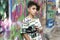 Boy portrait with grafiti behind