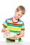 boy pours milk from a glass bottle