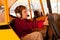 Boy pretends to fly Piper Cub airplane