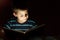 Boy reading bedtime story