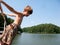 Boy ready to dive in lake