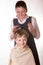 Boy at a reception at the barber. A young man visits the salon o