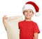 Boy in red hat with long scroll letter with wishes to santa