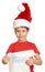 Boy in red hat with long scroll letter with wishes to santa