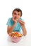 Boy relaxing with bowl popcorn