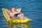 Boy relaxing on an inflatable mattress