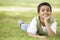 Boy relaxing in park