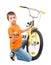 Boy repair bicycle