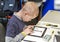 Boy repair tablet pc at CEE 2019 in Kyiv, Ukraine