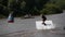 Boy rides on a wakeboard and jumping from a springboard