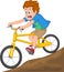 boy riding a bicycle on a downhill road
