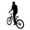Boy riding a bike silhouette