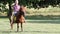Boy riding pony horse