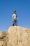 Boy on a rock at yoshua tree national park