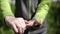 The boy rubs his hands with disinfectant gel. Close - up of hands.