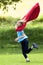 Boy Running Around in Red Towel