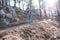 A boy runs along a mountain path