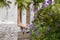 Boy`s bare feet on the porch fence