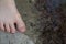 Boy`s Foot Wet While Playing Near Tidal Pools