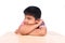 Boy sad siting alone at wooden table