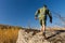 Boy Scout Walking on Old Big Rock at Camp Area