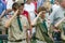 Boy Scouts saluting 76 new American citizens
