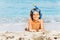 Boy in scuba mask on summer sea vacation