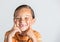 Boy showing missing teeth.