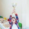 Boy showing trophy he has won in chess tournament