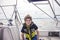 Boy sitting on sailboat wearing a life jacket