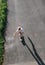 Boy skates on skateboard on asphalt road