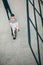 Boy skates on skateboard on asphalt road