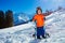 Boy with ski ready for skiing school stand over mountain