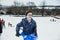 Boy Sledding with Friends