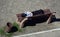 Boy sleeping on a bench