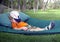 Boy sleeping in hammock