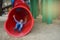 Boy slides down a spiral slide