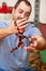 Boy with snakes. Man holds in hands reptile Milk snake Lampropeltis triangulum Arizona kind of snake.