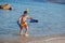 Boy with snorkeling equipment at tropical beach